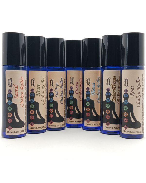 The seven Buelow Naturals chakra rollers are photographed.