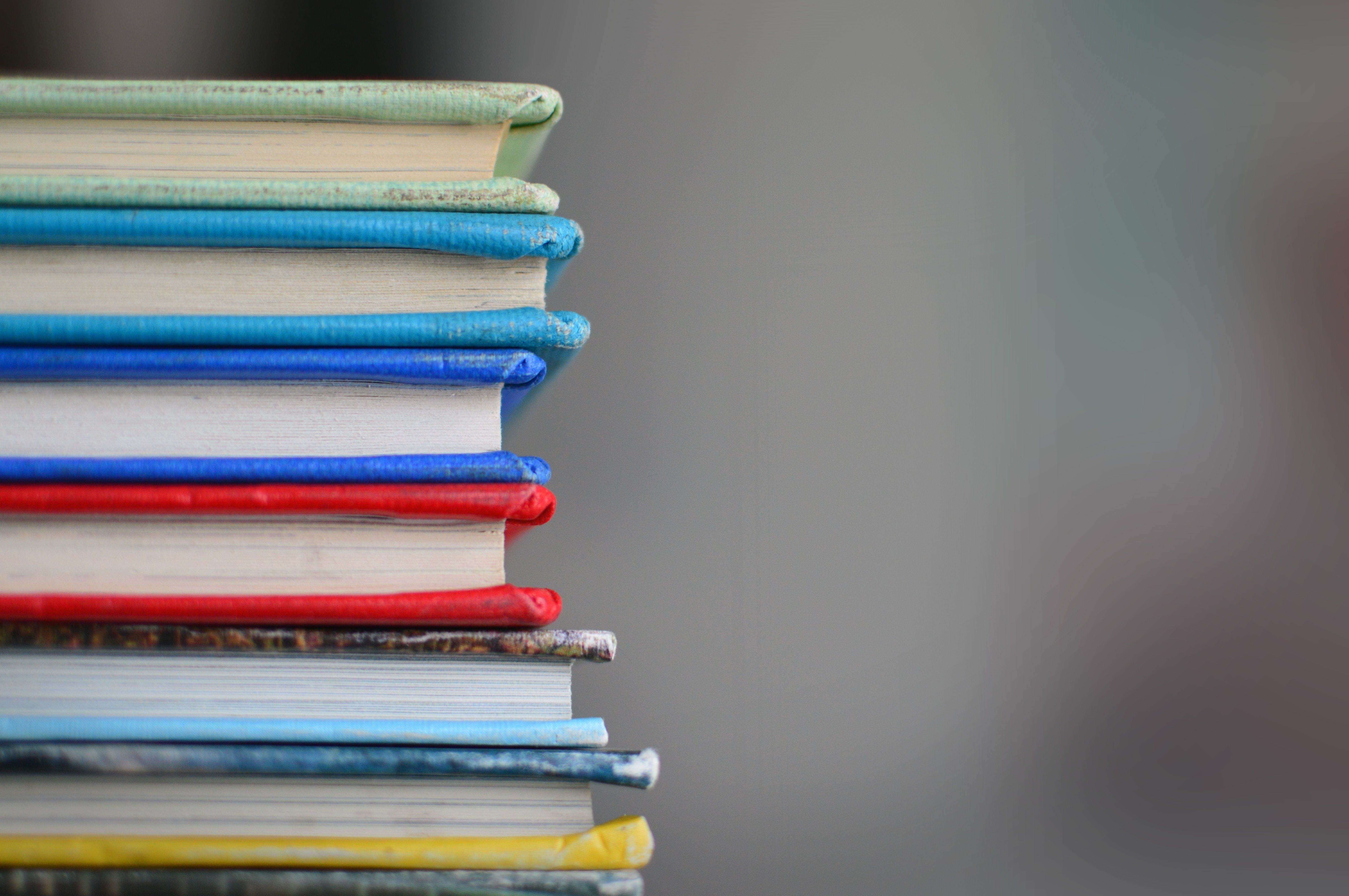 A stack of books represent learning and the passing down of knowledge.